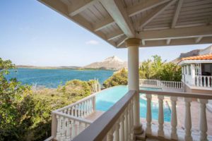 The real estate agent of Curacao offers: elegant waterfront villa in the prestigious gated community Seru Boca Estate,  Santa barbara plantation