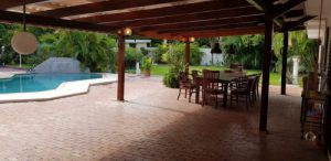 The real estate agent of Curacao offers: Elegant tropical home with pool in the green Emmastad district,  Willemstad