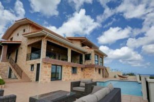 The real estate agent of Curacao offers: Unique villa in the luxurious Blue Bay Golf & Beach Resort ,  Willemstad