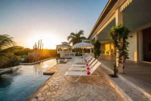 The real estate agent of Curacao offers: Luxury holiday villa for rent including a 17 m long swimming pool in Vista Royal,  Jan thiel