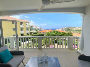 The real estate agent of Curacao offers: Apartment with swimming pool and amazing view over the Caribbean Sea, Blue Bay,  Curacao