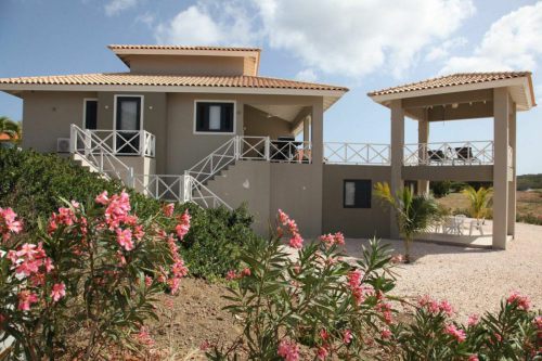 Blue Bay Curacao: huis met appartement, zwembad en vergezichten over de golfbaan 